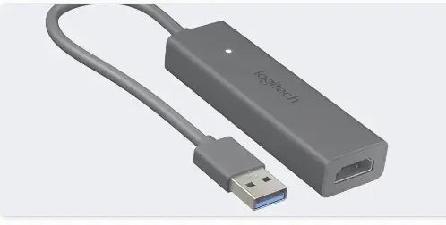 [El Logitech V-U0046 es el número de modelo oficial del dispositivo de captura Logitech Screen Share, el cual permite proyectar contenido desde una computadora hacia una pantalla de sala de conferencias de forma alámbrica mediante entradas HDMI y USB.Especificaciones PrincipalesTipo de componente: Dispositivo de captura de video/HDMIEntrada: HDMI 1.4a o superiorConexión: USB a la computadoraPeso: 30 gDimensiones: 83 mm x 24.7 mm x 14.2 mmCompatibilidad de SistemaWindows: Windows 8.1 y 10 (o posteriores)Mac: Mac OS X 10.10 (o posteriores)Uso: Diseñado para sistemas de salas de reuniones con la aplicación Logitech Screen Share.] ADAPTADOR LOGITECH V-U0046